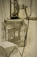 Image showing butter churn with a piece of butter