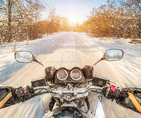 Image showing Biker First-person view. Winter slippery road