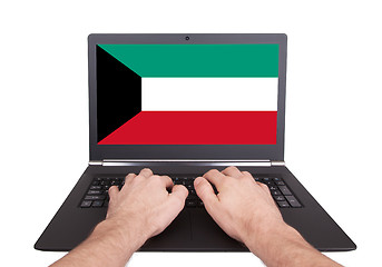 Image showing Hands working on laptop, Kuwait