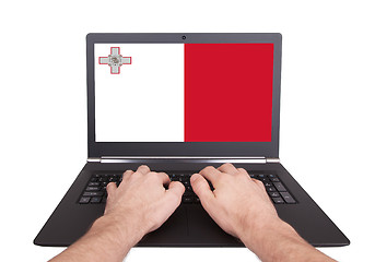 Image showing Hands working on laptop, Malta