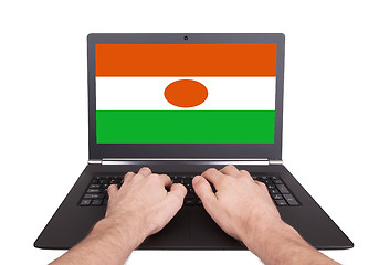 Image showing Hands working on laptop, Niger
