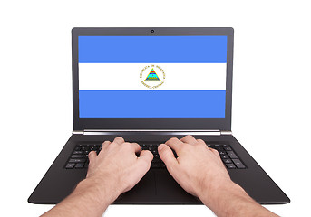 Image showing Hands working on laptop, Nicaragua