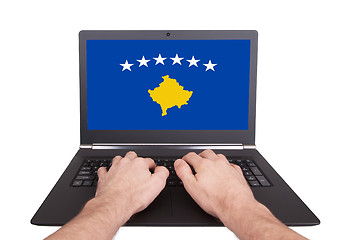 Image showing Hands working on laptop, Kosovo