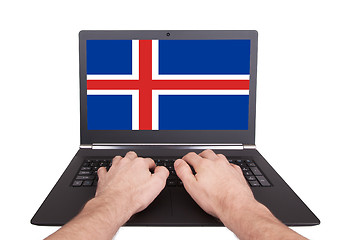 Image showing Hands working on laptop, Iceland