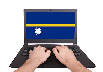 Image showing Hands working on laptop, Nauru