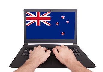 Image showing Hands working on laptop, New Zealand