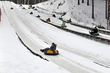 Image showing Children ride the route for a snoutyubing.