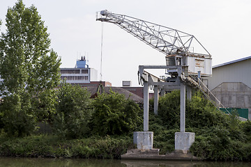 Image showing small dockside crane at river in germany