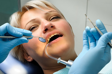 Image showing dentist with patient, dental calculus removal