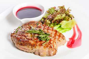 Image showing Grilled steaks and vegetable salad