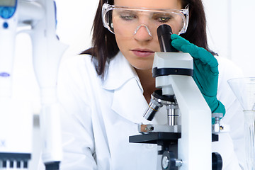 Image showing Young chemist in the laboratory.