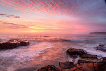 Image showing Sunrise skies and white water seas