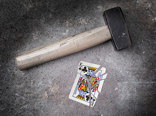 Image showing Hammer with a broken card, king of clubs