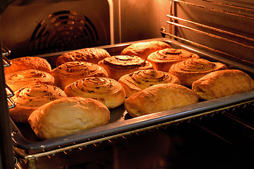 Image showing Baked cakes on a tray