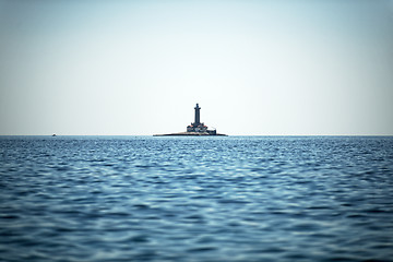 Image showing Old lighthouse on a rock island