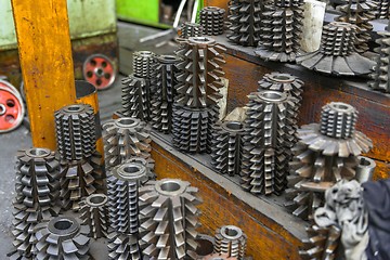 Image showing Industrial drill bits stacked up