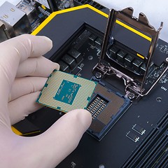 Image showing Human hand holding modern processor