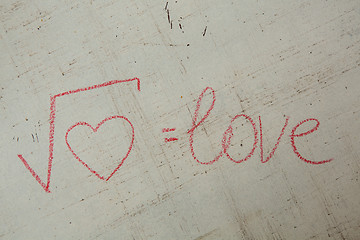 Image showing Square root of heart on white. Handwritten love formula. 