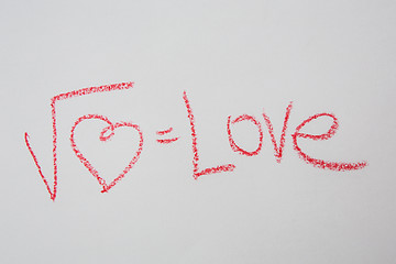 Image showing Square root of heart on white paper. Handwritten love formula. 