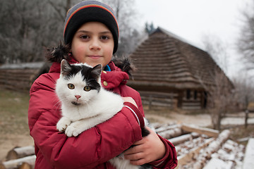 Image showing Boy with cat