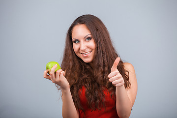 Image showing Girl and apple