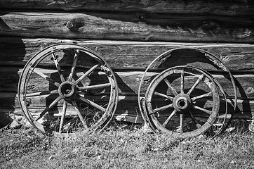 Image showing Old wheel from carts in the countryside  