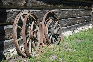 Image showing Old wheel from carts in the countryside  