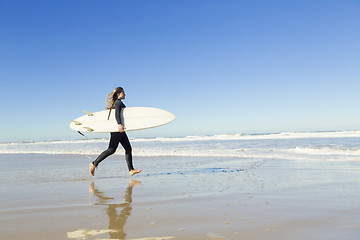 Image showing Surf girl