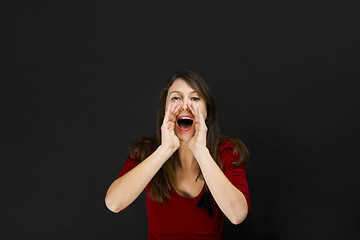 Image showing Female student calling someone