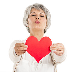 Image showing Holding a heart in her hands