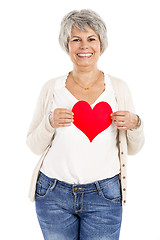 Image showing Holding a heart in her hands