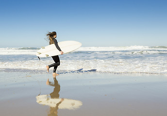 Image showing Surf girl