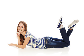 Image showing Woman lying on the floor