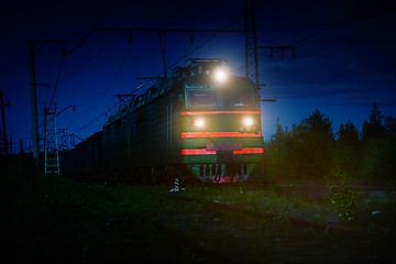 Image showing Electric Freight Train Approaching Polyarnye Zori, Russia, at Ni