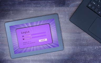 Image showing Login interface on tablet - username and password, cold blue fil