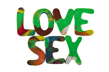 Image showing Sex and love spelled out using colored plasticine 