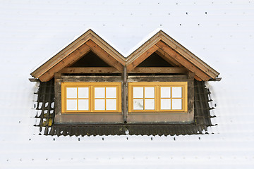 Image showing Roof windows under snow