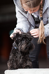 Image showing Girl with dog