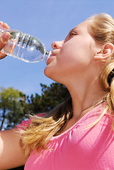 Image showing Girl drinking water