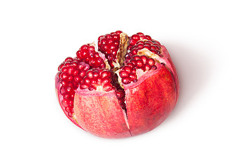 Image showing Broken Bright Ripe Delicious Juicy Pomegranate Top View Rotated