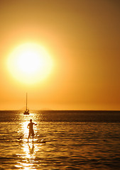 Image showing Stand-up on sunset on Itaipu Beach