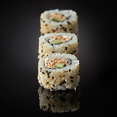 Image showing sushi with salmon and cucumber