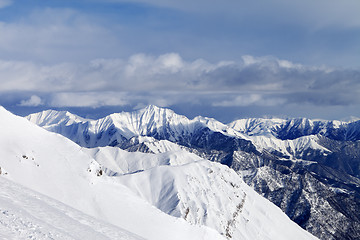 Image showing Off-piste slope and snowy mountains