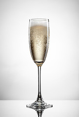 Image showing champagne in glass isolated on white
