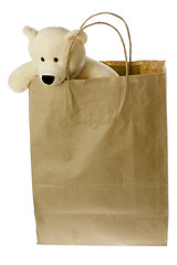 Image showing Teddy bear in brown paper bag

