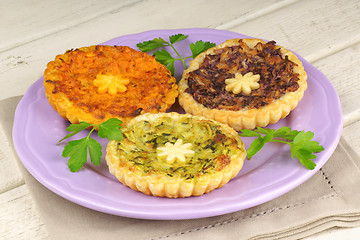 Image showing Three mini vegetarian quiches