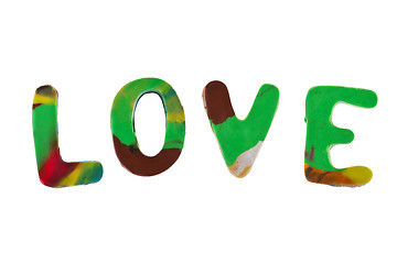 Image showing Plasticine letters forming word LOVE written on white background