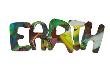 Image showing Plasticine letters forming word Earth written on white background