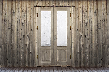 Image showing door with frosty window of plank house