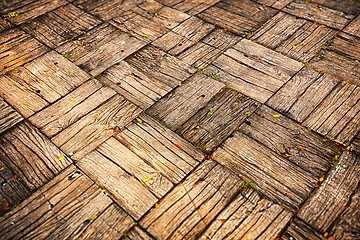 Image showing Weathered Parquet Style Decking at Oblique Angle
